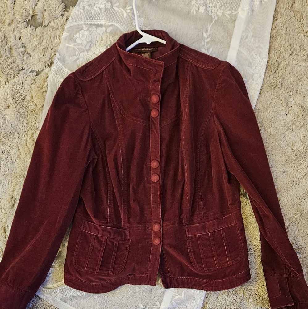 Vintage burgundy, very cool jacket. Made of cotton and spandex.